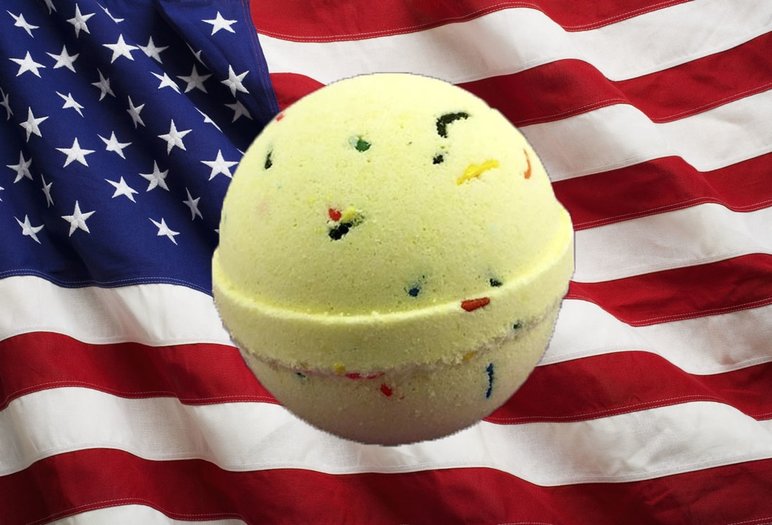 Bath Bomb with Sprinkles in front of an American flag